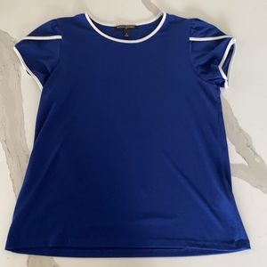 Banana republic military blue blouse with white piping on neckline and sleeves.